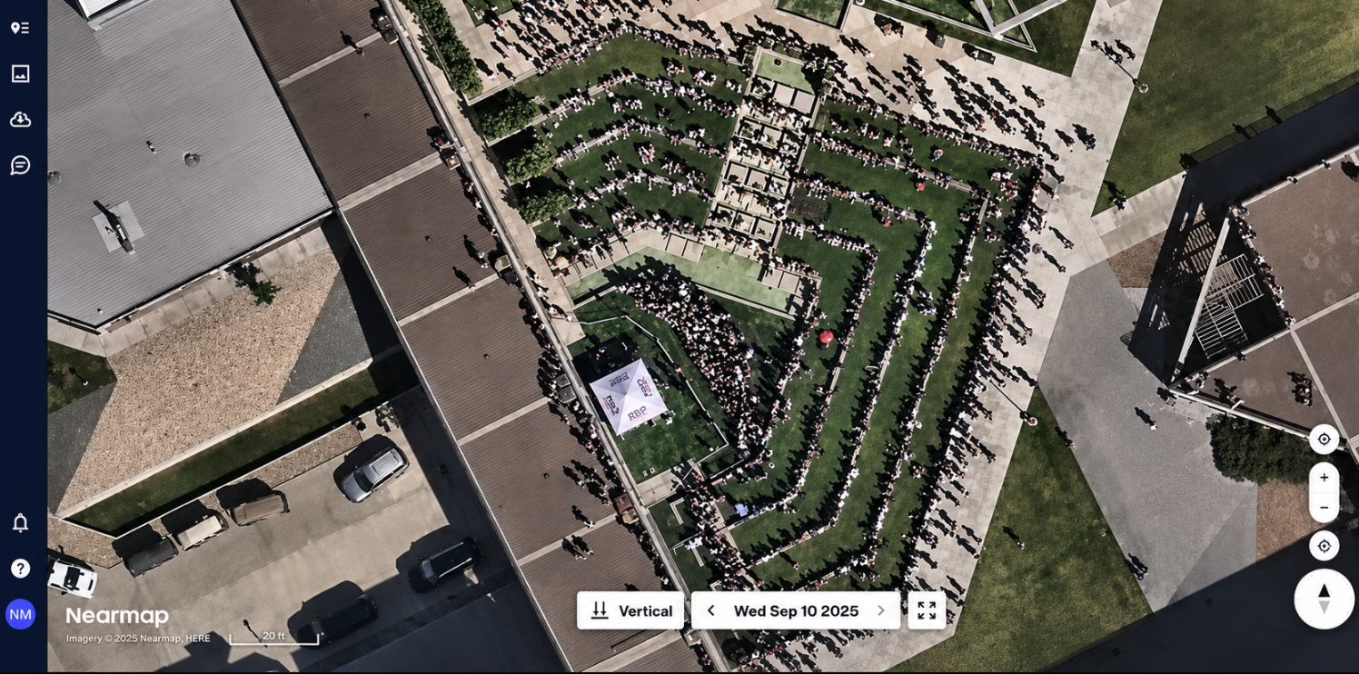 A second aerial map view of the same courtyard, zoomed out further, showing the full amphitheater seating and the surrounding buildings