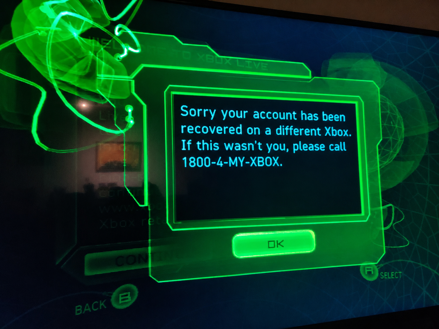 Xbox 360 dashboard message: Sorry your account has been recovered on a different Xbox. If this wasn't you, please call 1800-4-MY-XBOX.