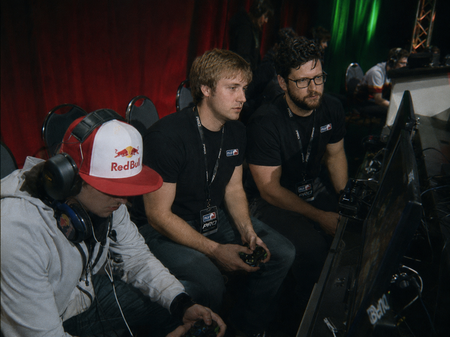 Mixstyle and RobbieB seated courtside working the controllers during a 4v4 match at MLG Anaheim 2009